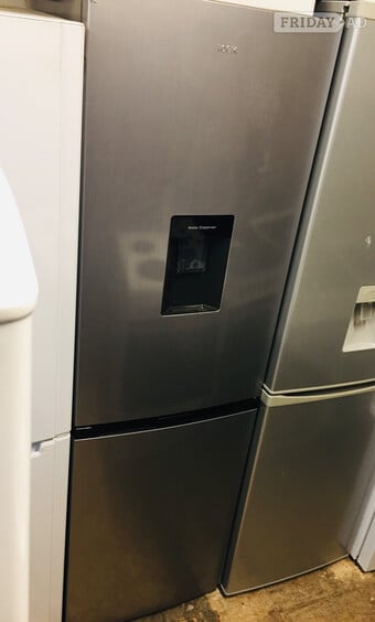 Logik fridge freezer with water dispenser in excellent condition.