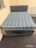Rotherham Double Economy Mattress with black divan base and headboard