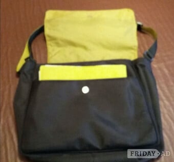 Nappy bag with folding changing mat