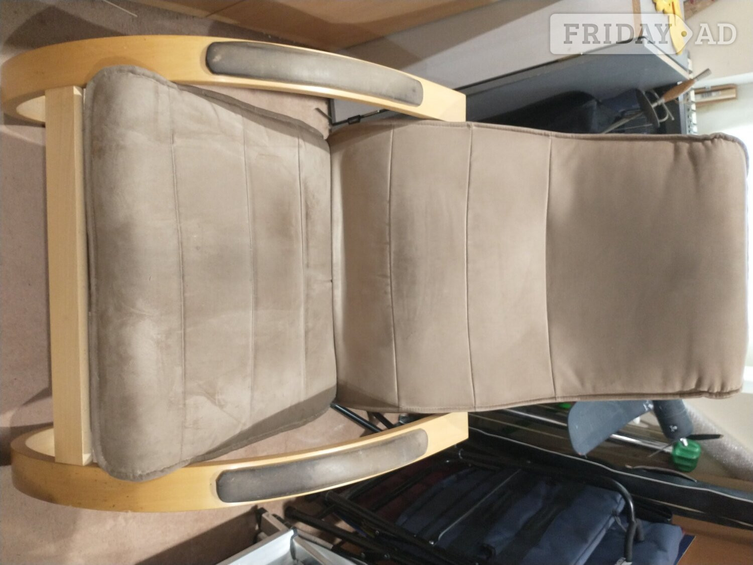 North Walsham Comfortable chair. Wood surrounds.