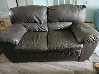 Brown leather two seater sofa