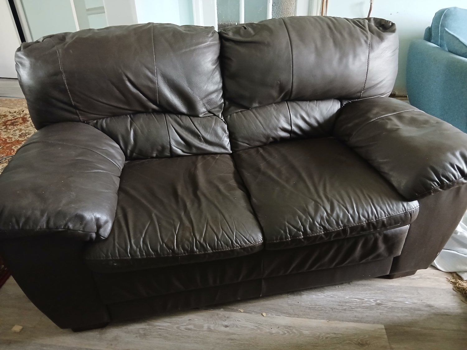 Brown leather two seater sofa