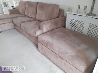 Right hand corner sofa and ottoman. Taupe velvety material. 