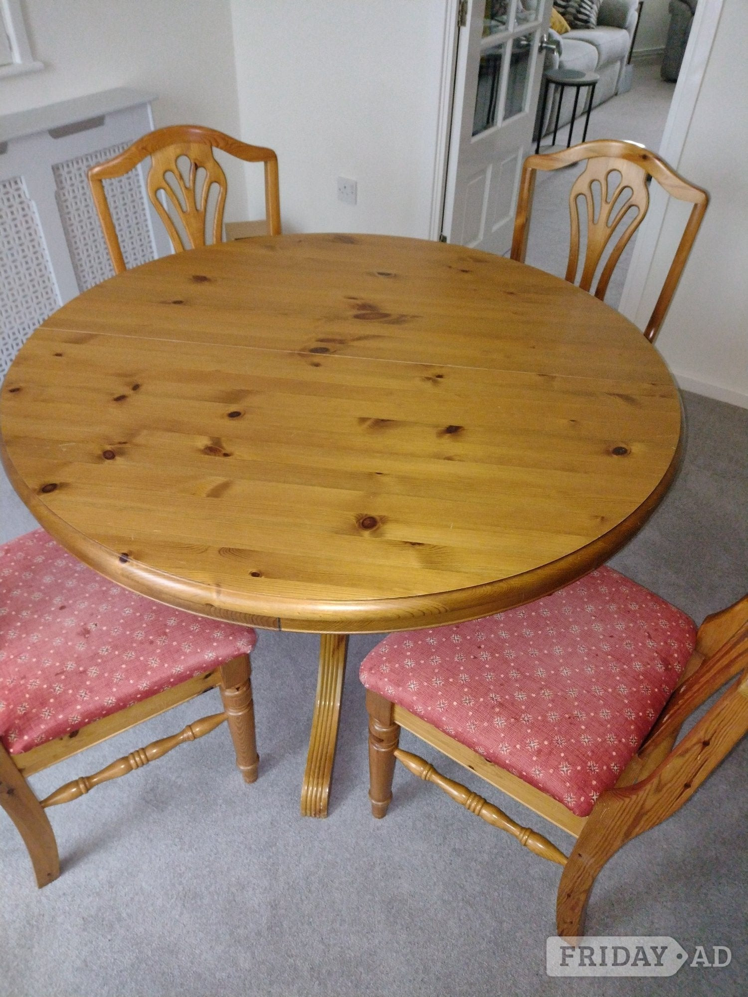 Gravesend Ducal Victoria pine extending dining table with pedestal base.