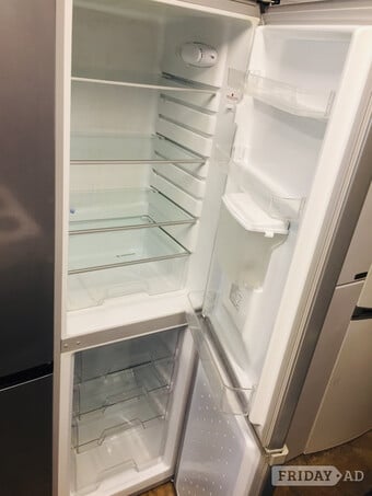 Hoover silver fridge freezer frost free with water dispenser.