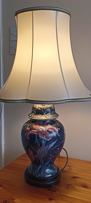 Vintage style floral ginger jar lamp with wooden base and shade.