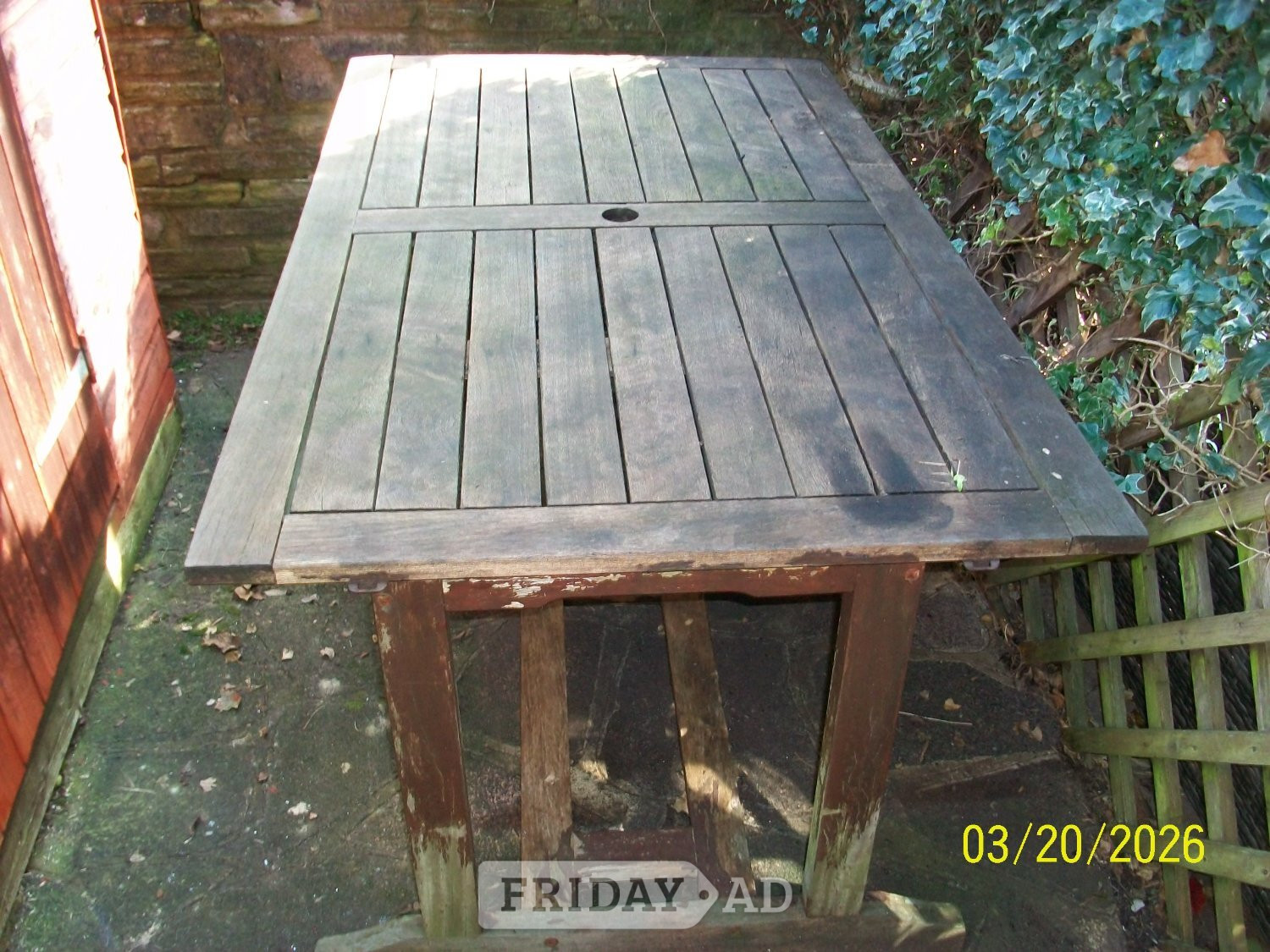 Hard wood garden table in Eastbourne