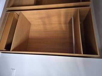 Ikea wardrobes with hanging rails draw spce and a glass top 