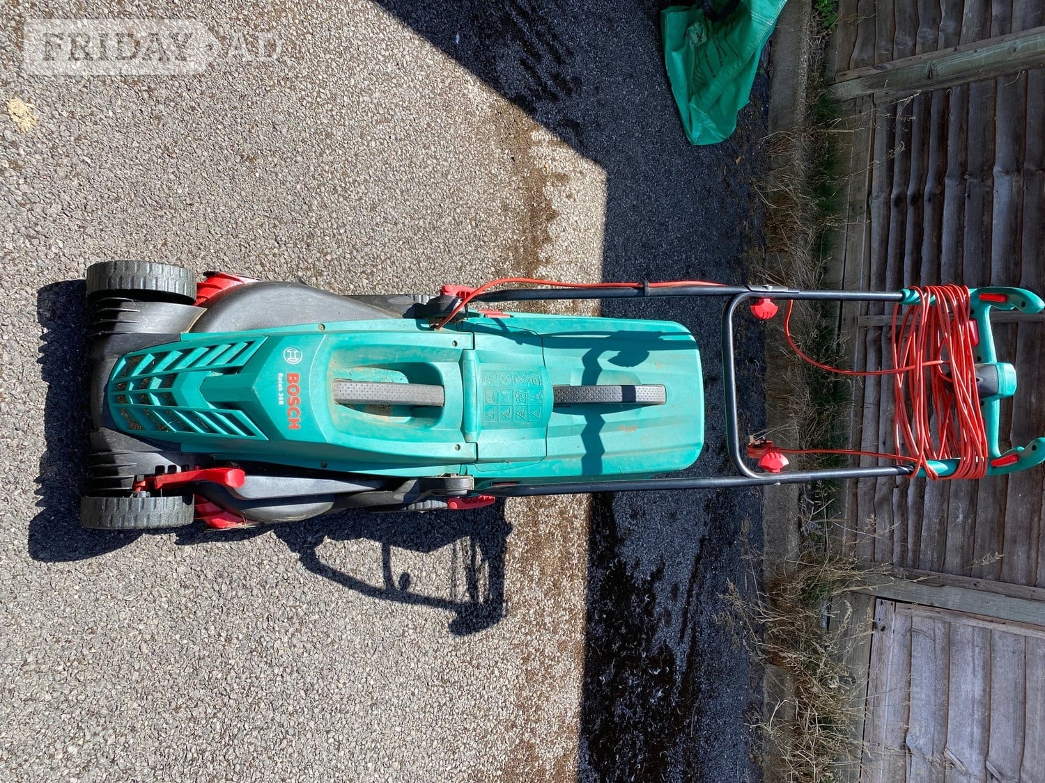 Bosch Rotec 36 electric lawn mower for sale with cable & 2 boxes in Wokingham
