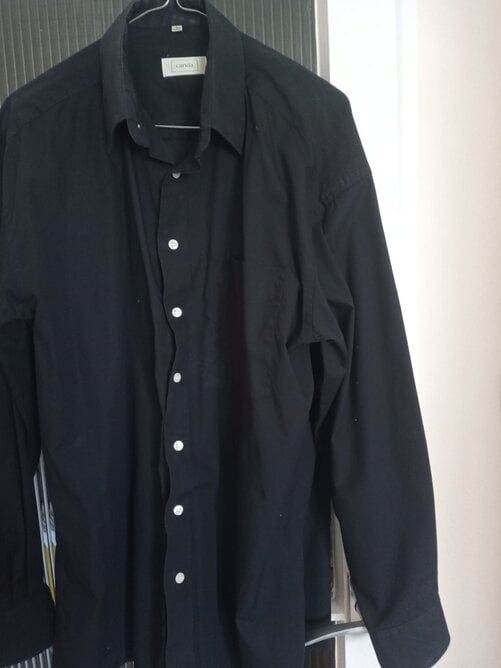 TWO new black shirts never worn