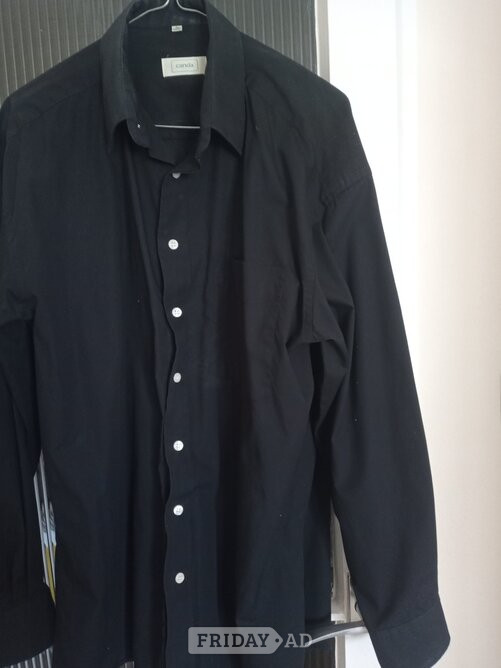 TWO new black shirts never worn