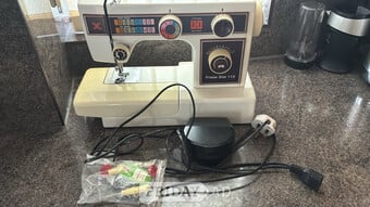 Portable Frister Star 112 sewing machine.