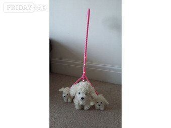 Animagic dog and pups attached on a lead good condition.