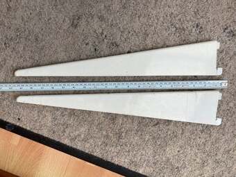 2 x Heavy duty twin slot shelving brackets.