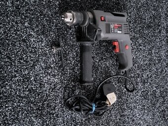 Hammer drill with handle