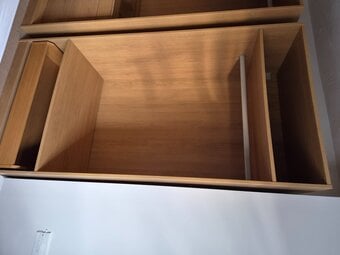 Ikea wardrobes with hanging rails draw spce and a glass top 