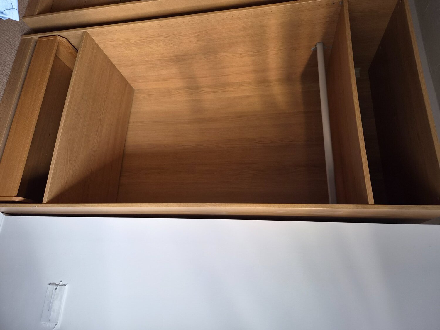 Colwyn Bay Ikea wardrobes with hanging rails draw spce and a glass top 