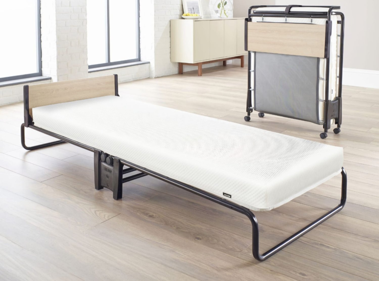 Two folding beds, as new.