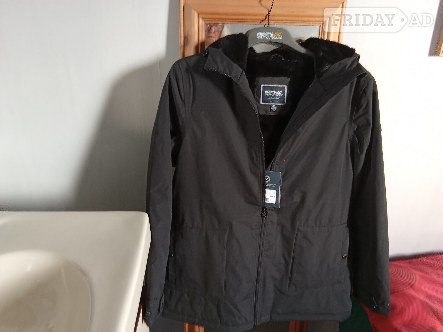 Regatta waterproof ladies coat  black with hood  in Seaford