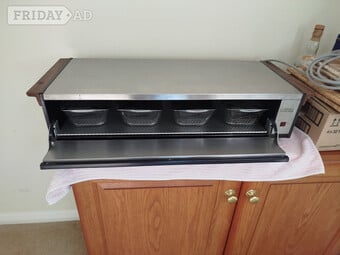 Vintage "Hostess" cabinet to keep serving dishes warm