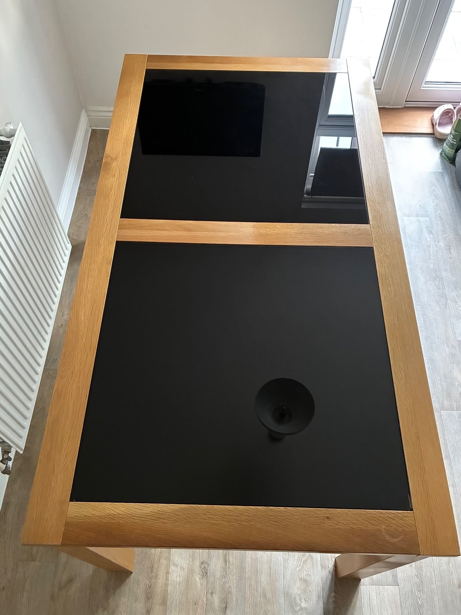 Eastbourne Stunning Oak Dining Table with sleek Black Glass Panels 