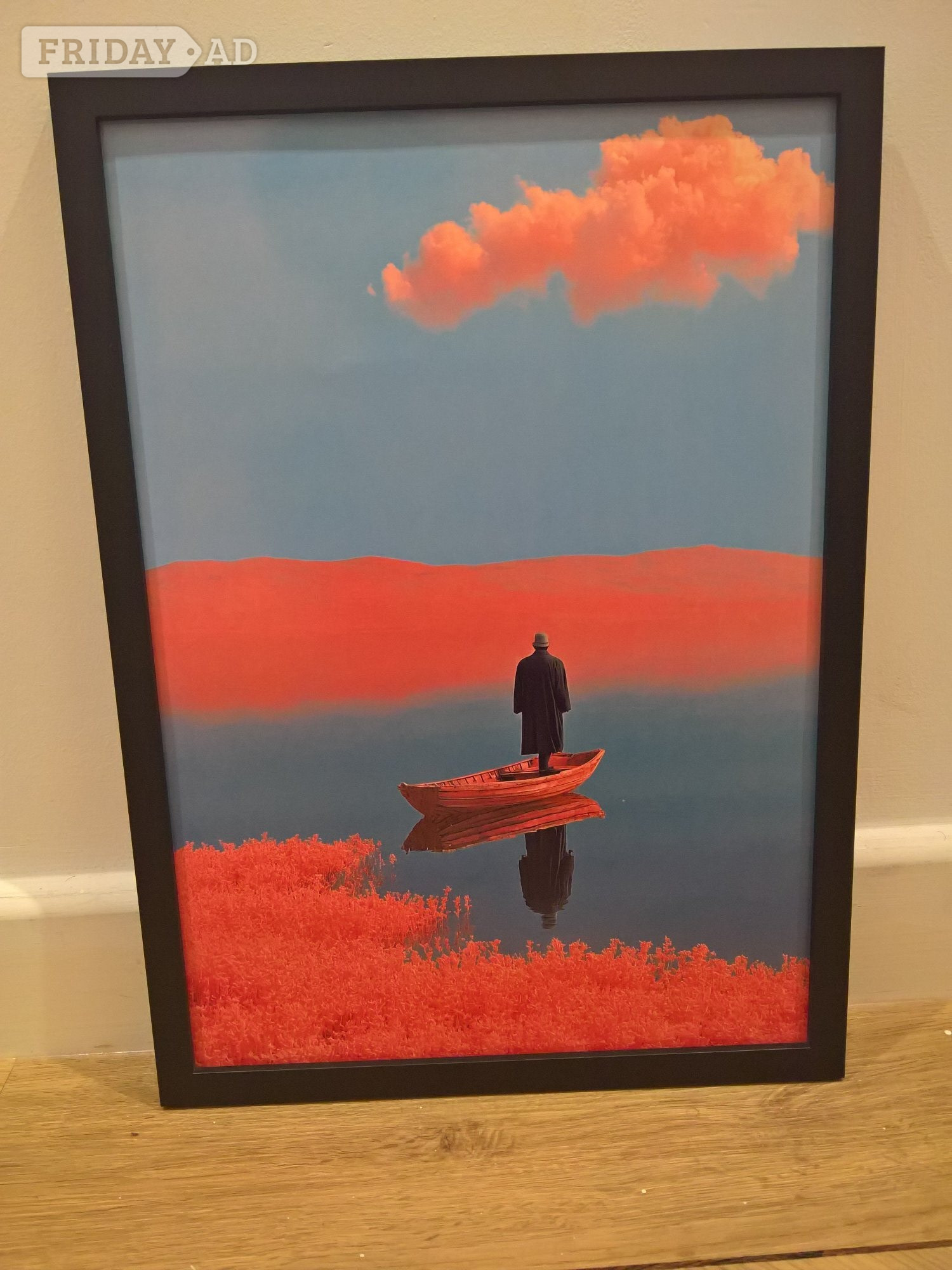 Man on red canoe poster black mdf frame a3