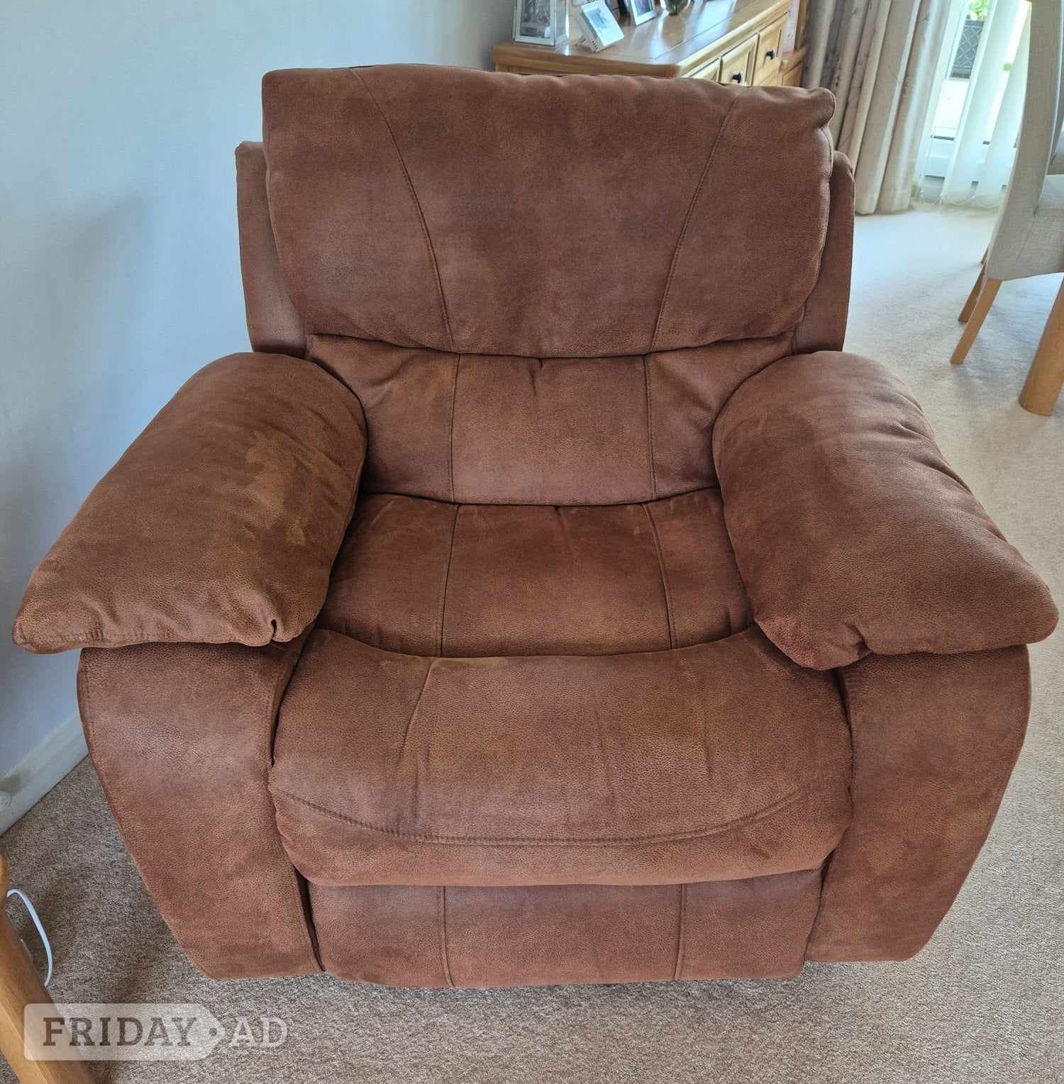 Brown sofa, armchair and footstool in Horsham