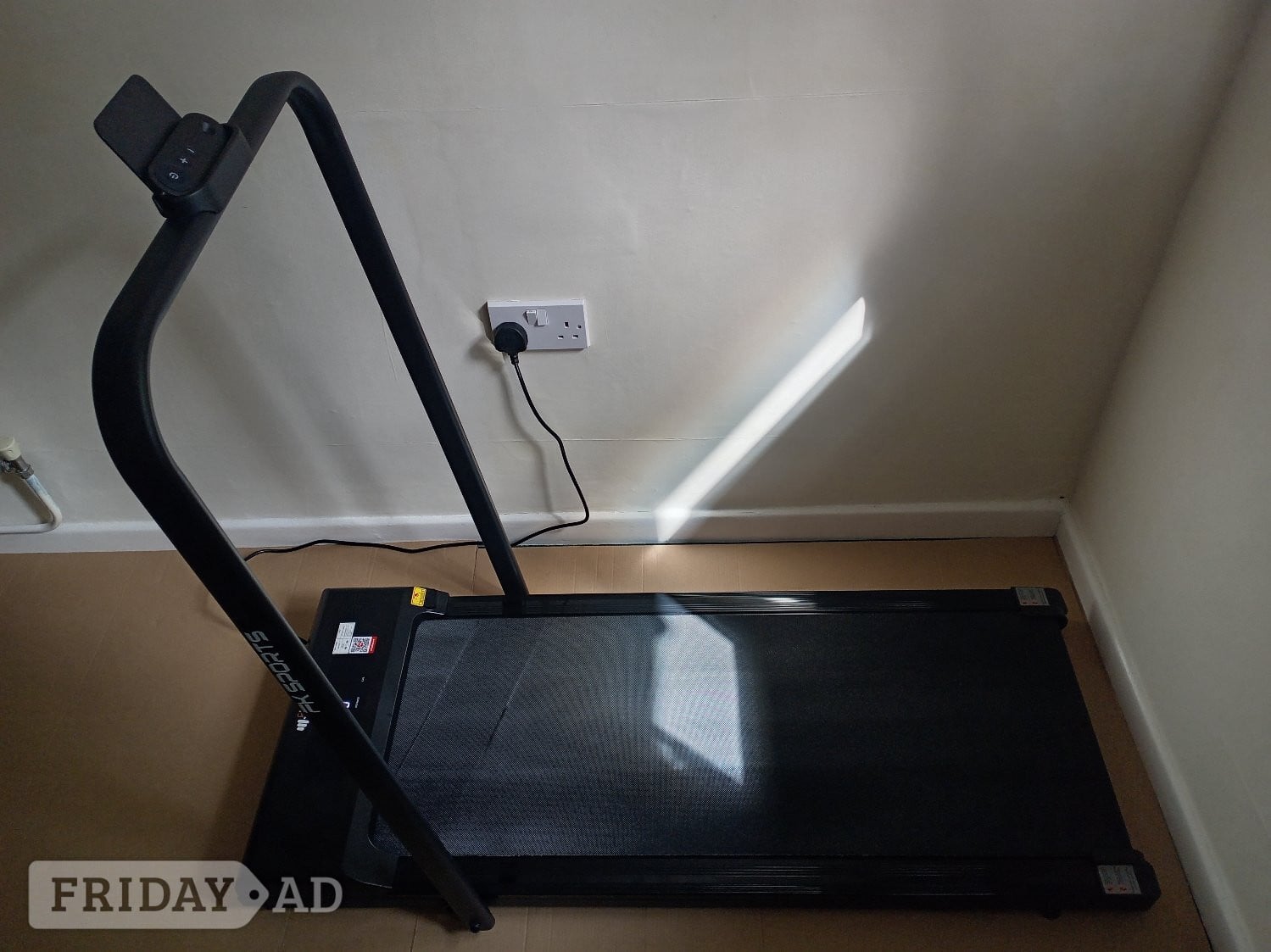 Black Electronic Foldaway walking machine. 