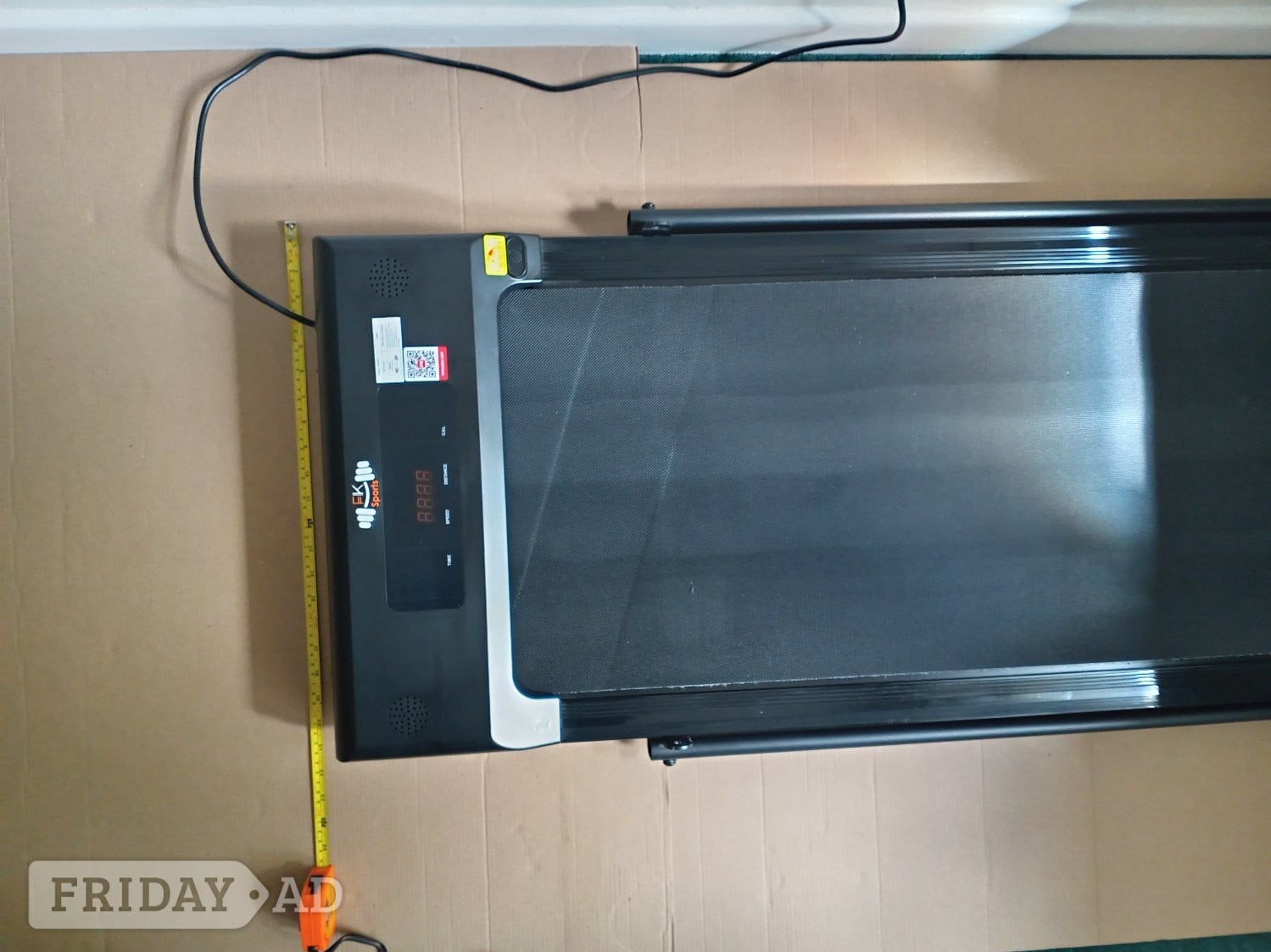 Black Electronic Foldaway walking machine.  - Sports Equipment