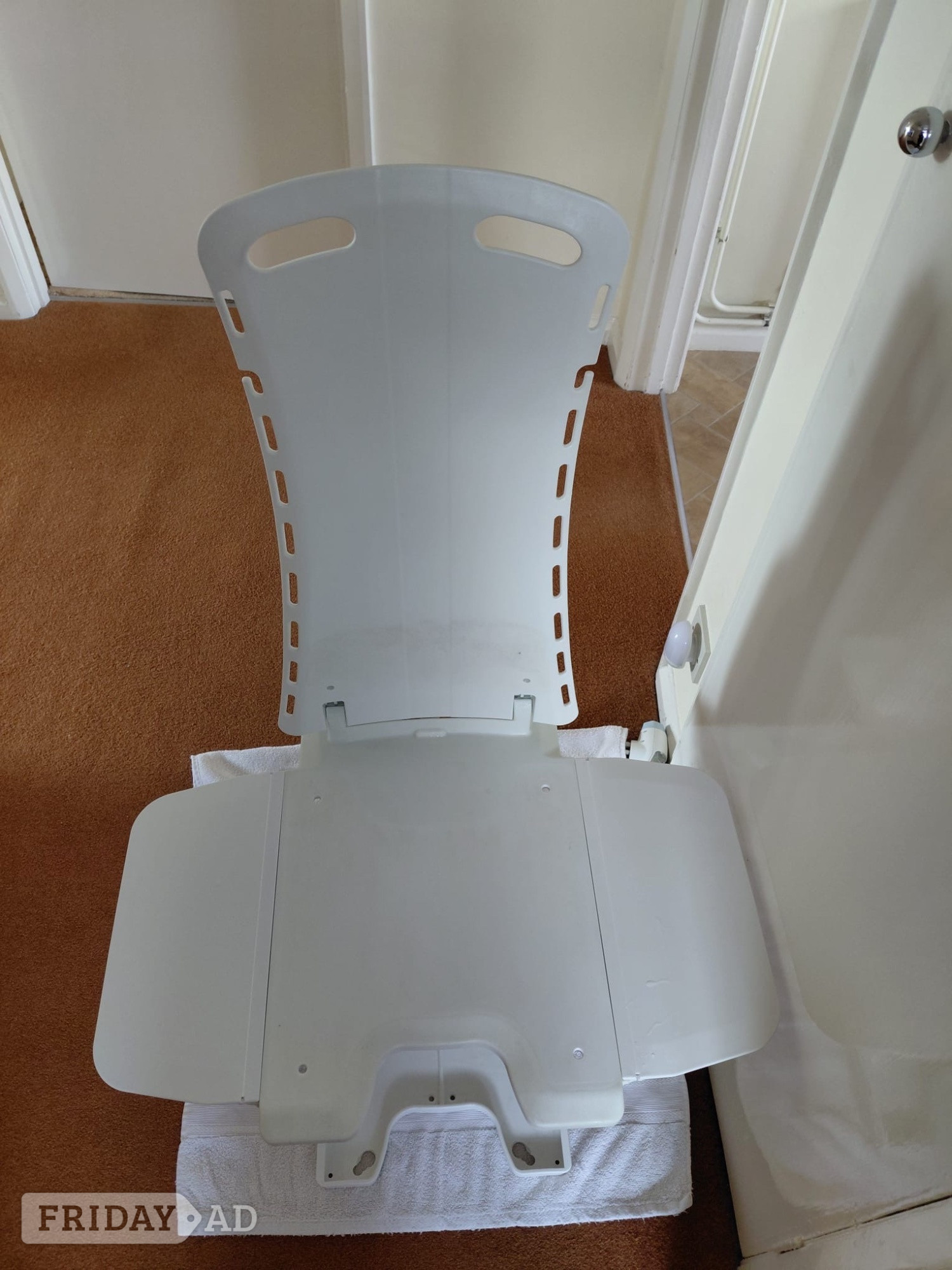 Remote controlled bath seat