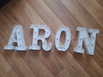 Battery lit 'ARON' named letters