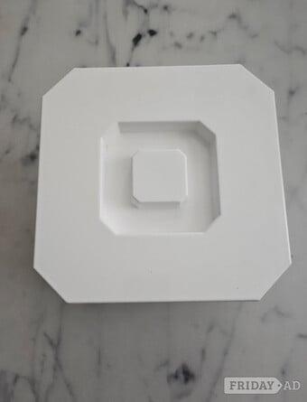White plastic ice bucket.