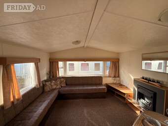 Reduced caravan at Felixstowe Beach