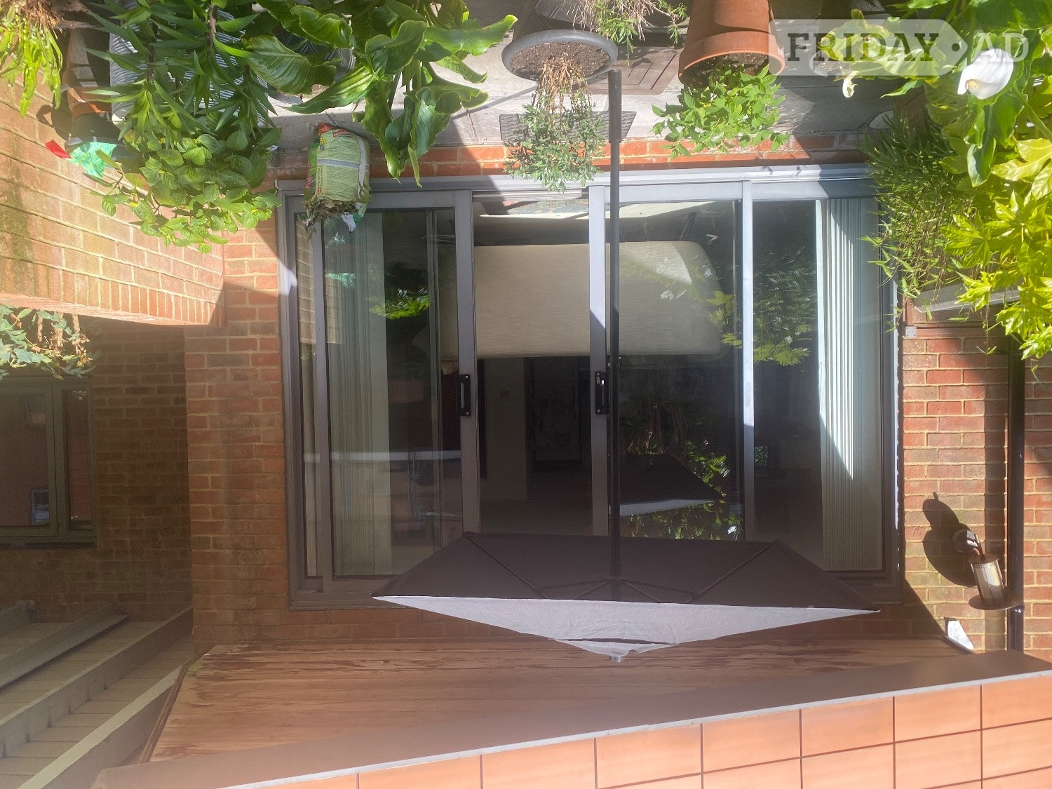Black garden umbrella, used twice - Garden in Hove