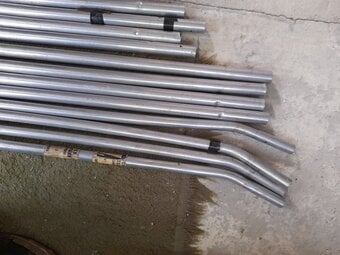 Collection of tent poles and accessories 