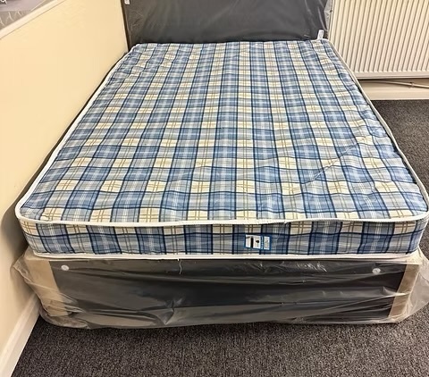 4 Foot Economy Mattress with black divan base and headboard - Furniture in Rotherham