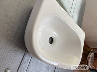 White cloakroom basin.