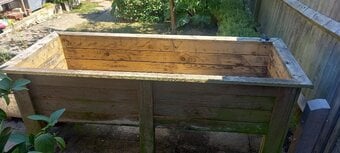 Large wooden trough for planting