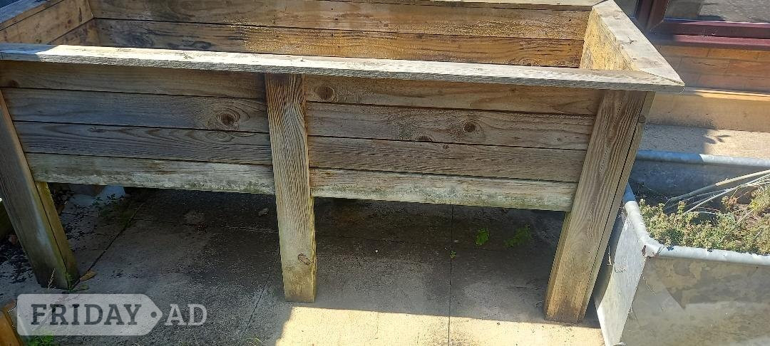 Large wooden trough for planting