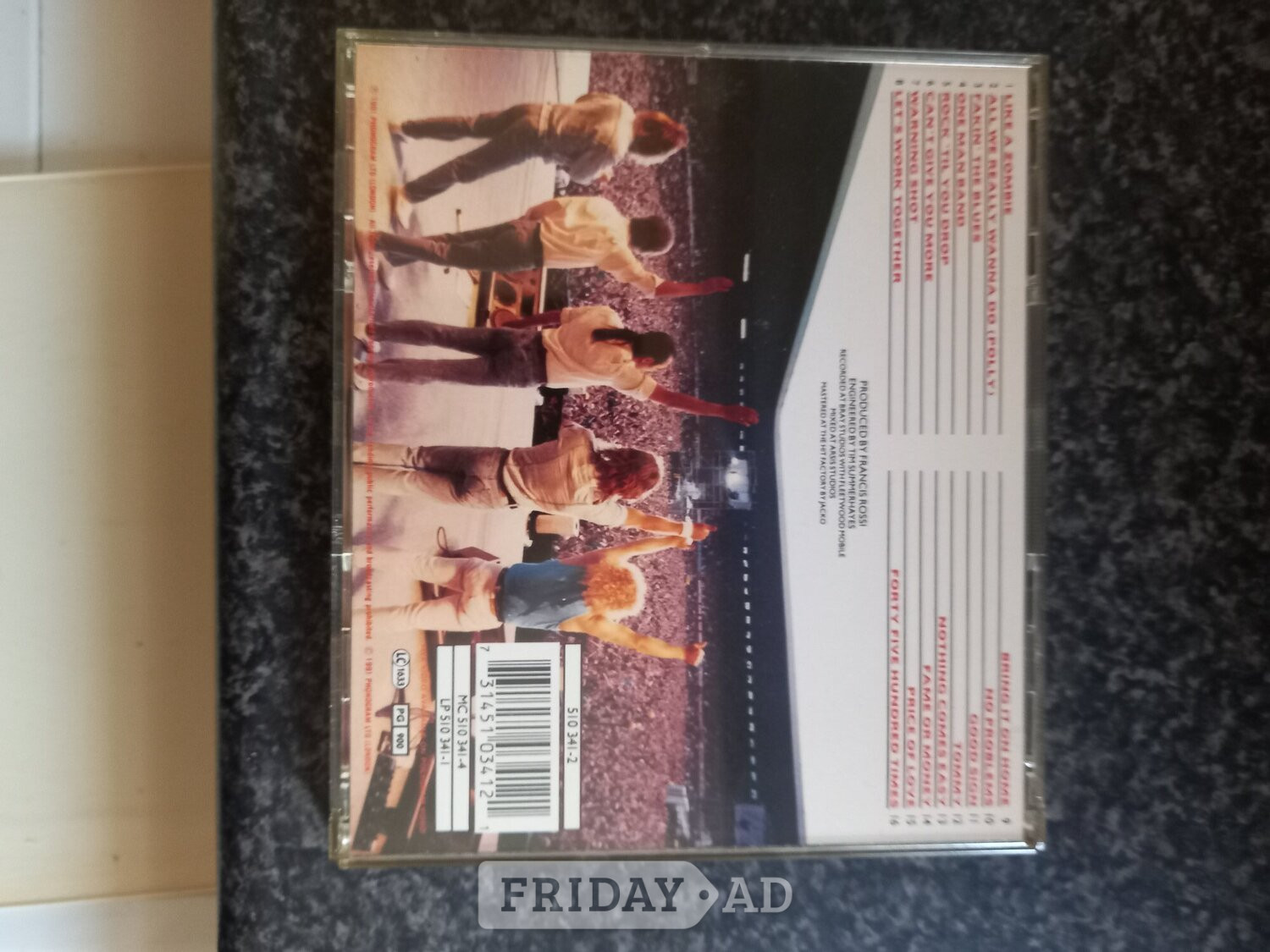 Bristol "ROCK 'TIL YOU DROP " STATUS QUO CD  (SIGNED COPY)