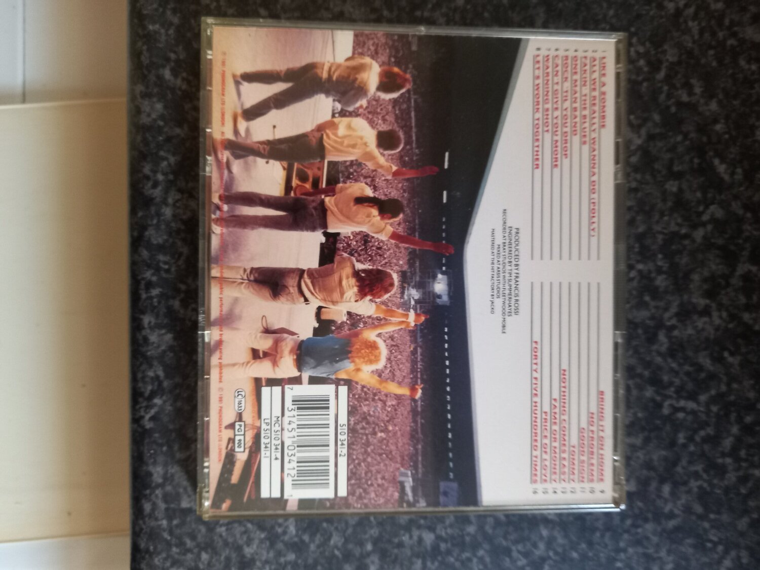 Bristol "ROCK 'TIL YOU DROP " STATUS QUO CD  (SIGNED COPY)