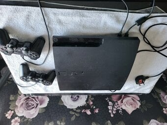 sony play station 3  with controllers see discription