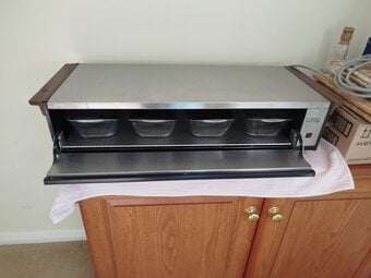 Vintage "Hostess" cabinet to keep serving dishes warm