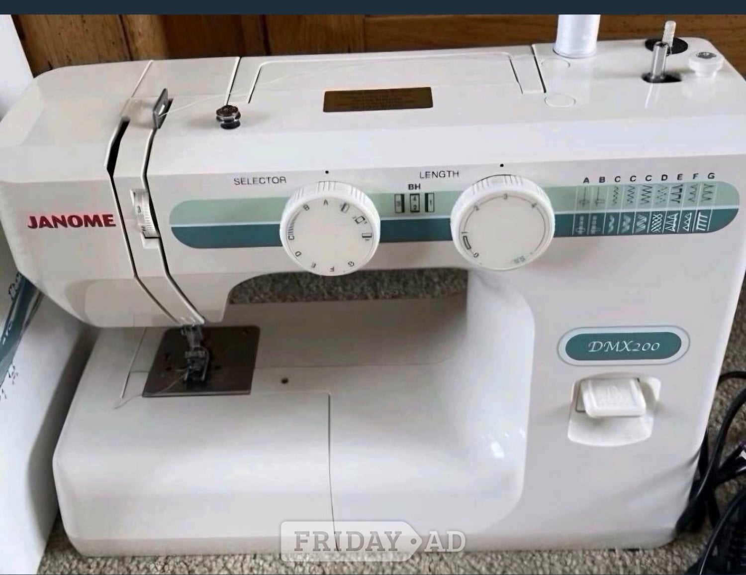 Janome DMX 200 sewing machine in new condition throughout 