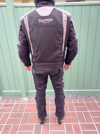 TRIUMPH MOTOR CYCLE SUIT .