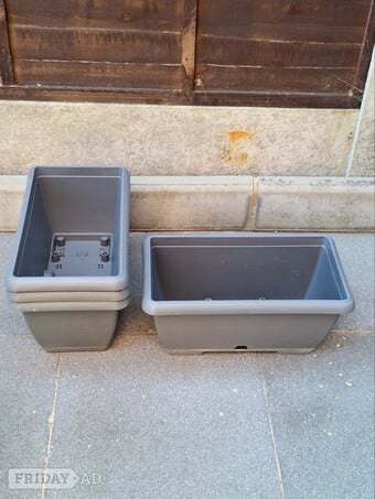 4 Box planters with attached saucers 