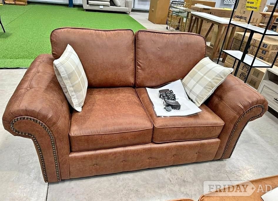 Brown 2 seater leather sofa ¬ Delivery Available 