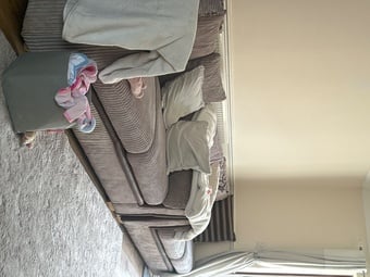 A corner sofa and a armchair with it as well 