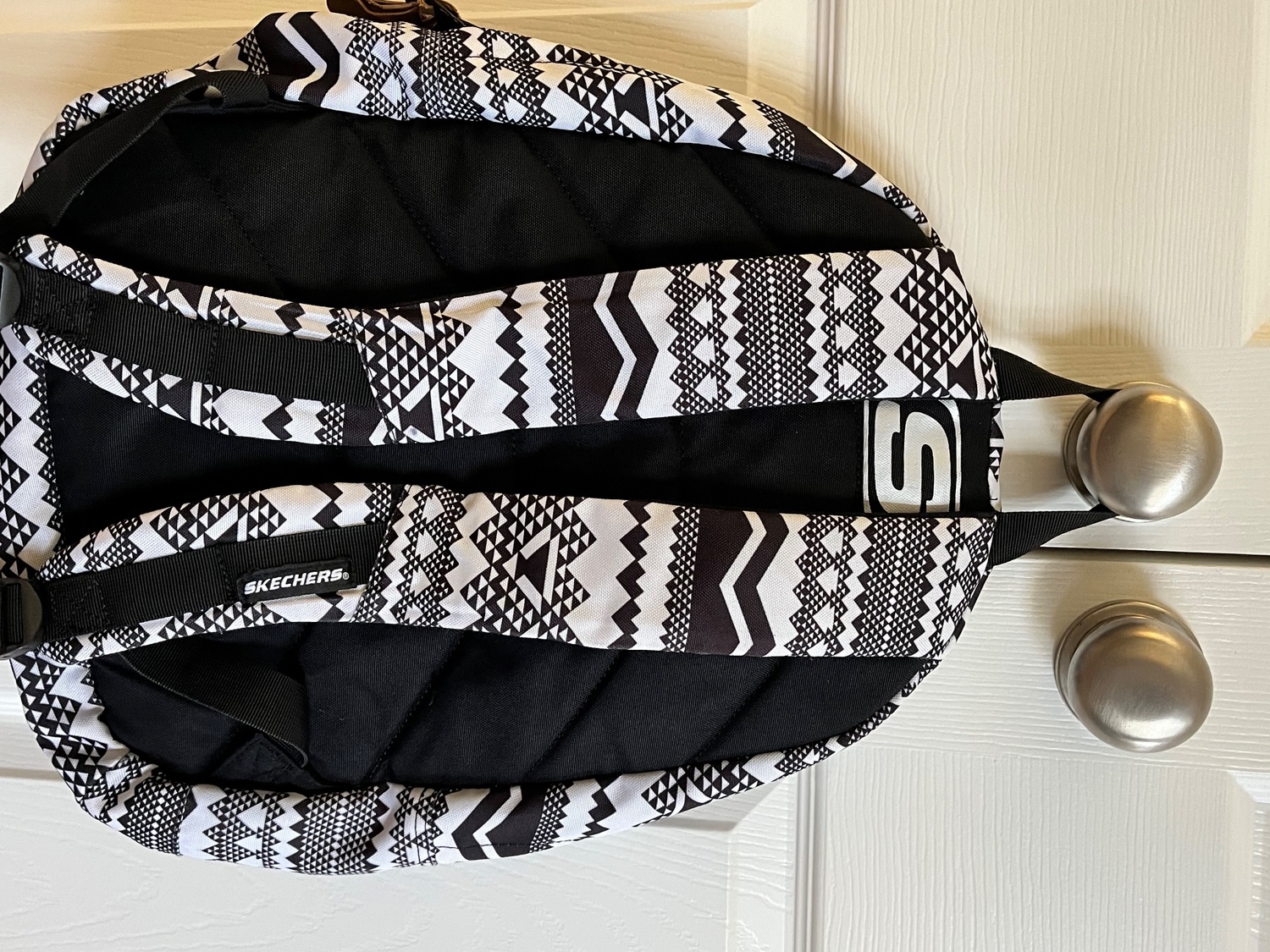 Sketchers Black & white backpack 