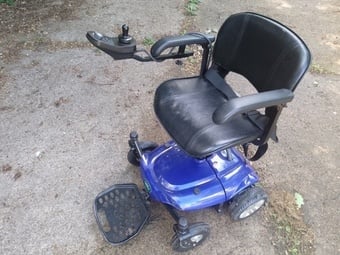 Power Wheelchair, will breakdown to fit in boot. 